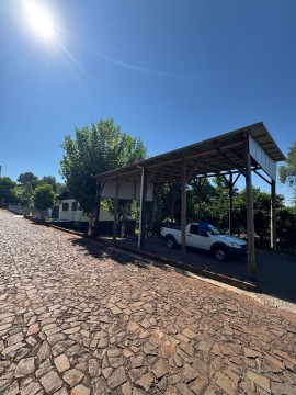 1106  TERRENO COM CASA E PAVILHÃO